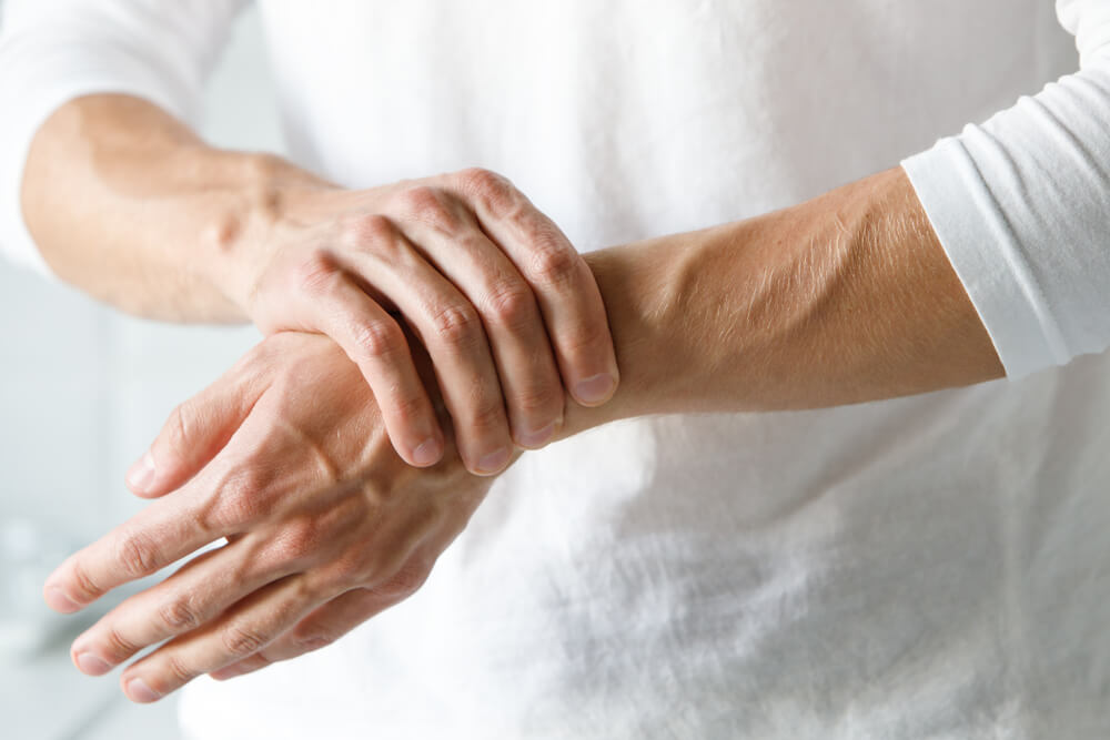 What can I do about pain on the outside of my wrist? shutterstock 1499052893 pain on outside of wrist