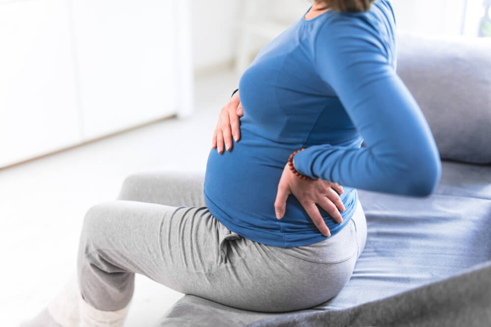 Why do I have hip pain during pregnancy and what can I do? shutterstock 1588563721 is lower back pain normal in the early stages of pregnancy?