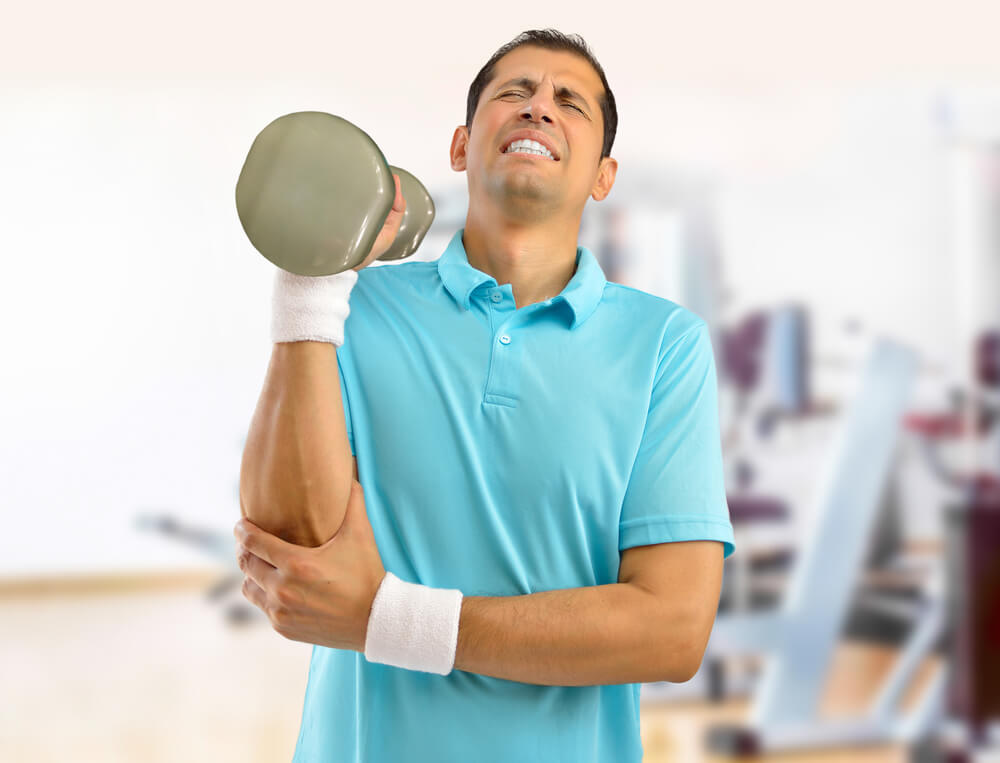 Why do I have elbow pain when lifting heavy objects? shutterstock 720075148 elbow pain when lifting