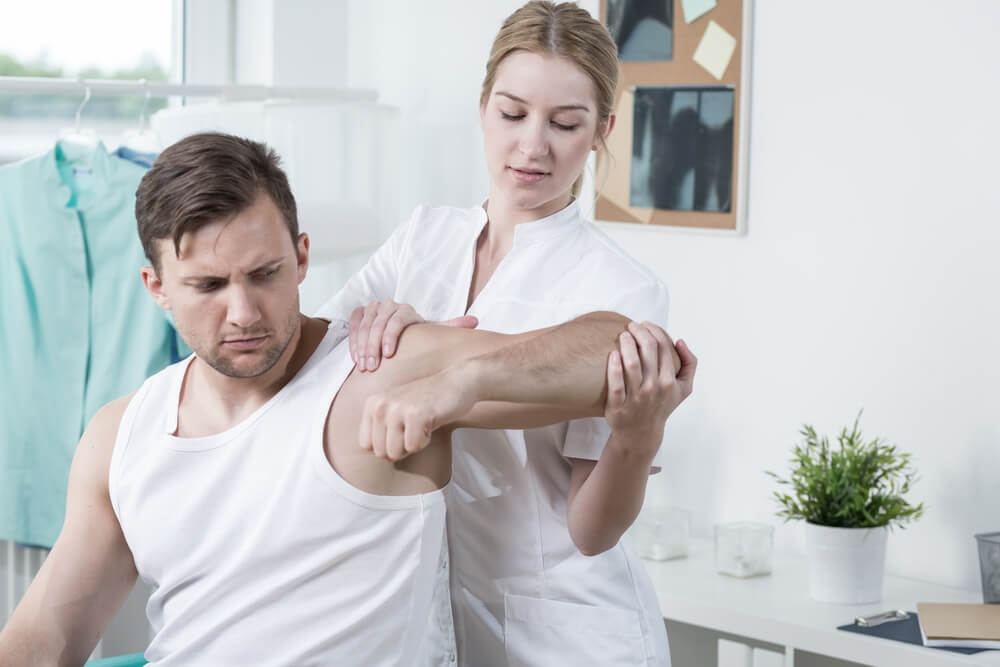 How long is physical therapy after rotator cuff surgery?