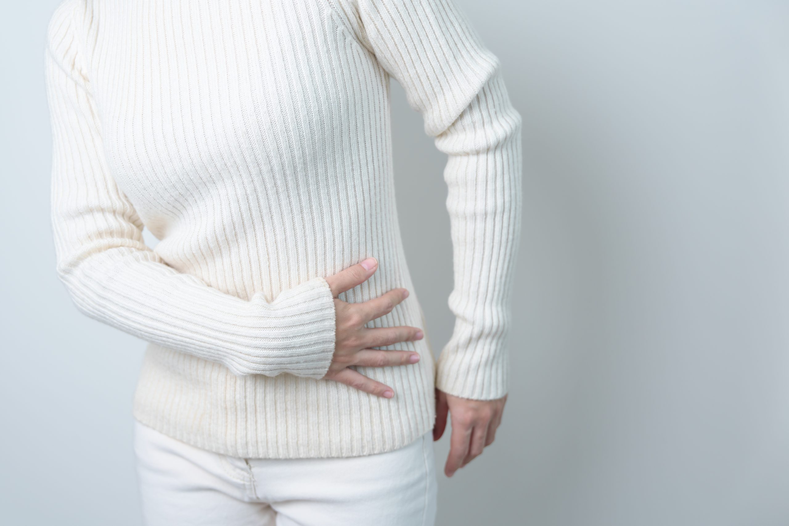 Why Does My Stomach Hurt and Radiate To My Back? AdobeStock 566883676 scaled Why Does My Stomach Hurt and Radiate To My Back?