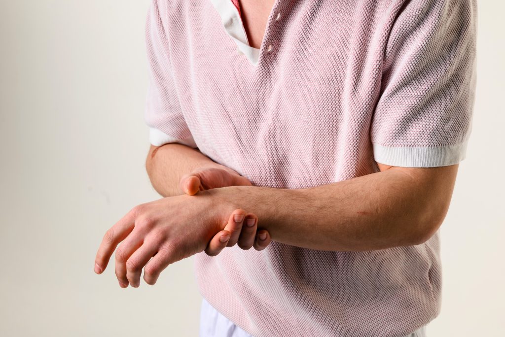 Why is My Wrist Swollen? Treatments for Wrist Injuries AdobeStock 882974713 why is my wrist swollen? treatments for wrist injuries wrist pain