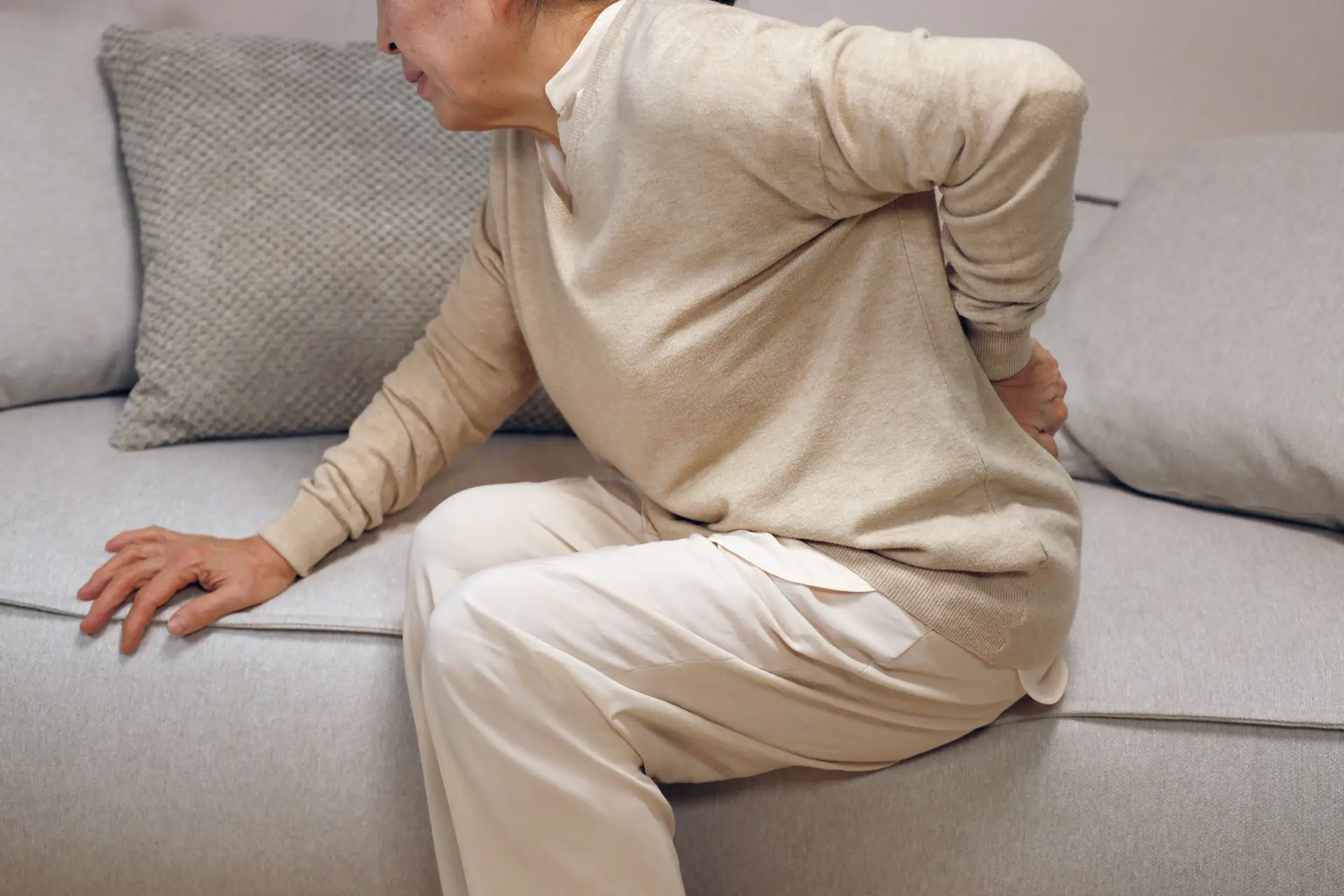 Why Does the Bottom of my Back Hurt? AdobeStock 1176734558 scaled Why Does the Bottom of my Back Hurt?
