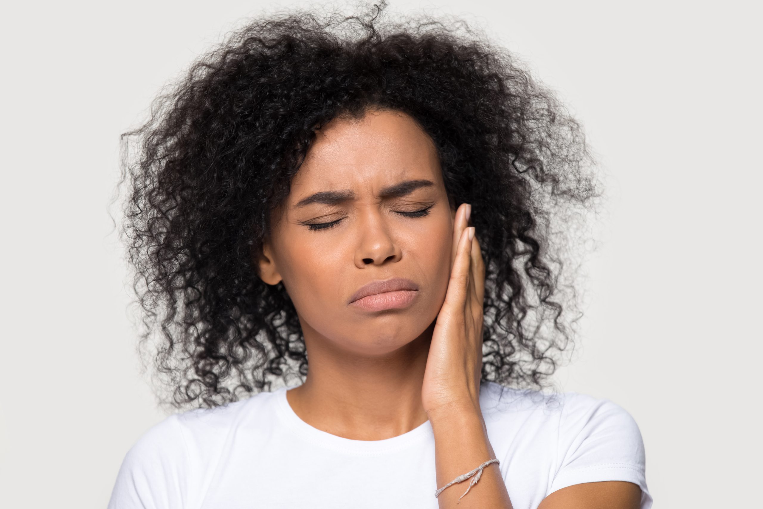 Stretches and At-Home Treatments for Jaw Tension AdobeStock 306841309 scaled Stretches and At-Home Treatments for Jaw Tension